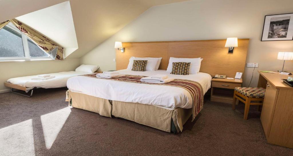 Postel nebo postele na pokoji v ubytování Best Western The Dartmouth Hotel, Golf & Spa
