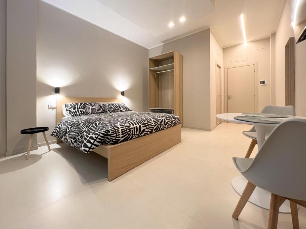 Postel nebo postele na pokoji v ubytování B&B Il Rifugio Urbano