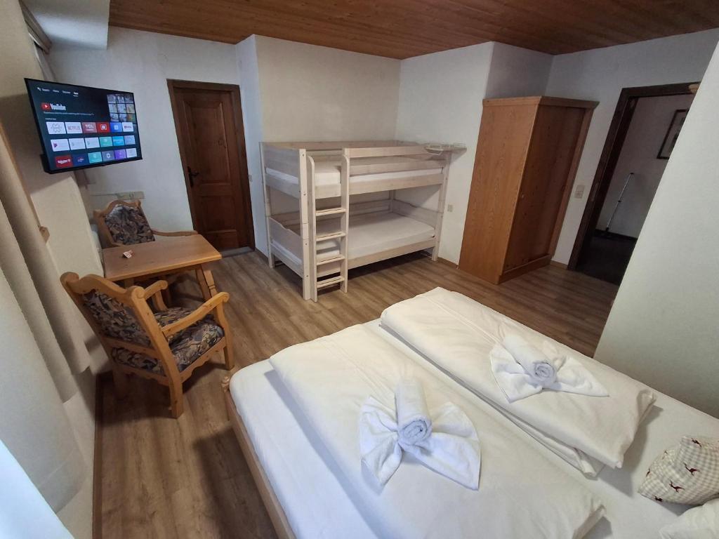 Postel nebo postele na pokoji v ubytování Pension Razil