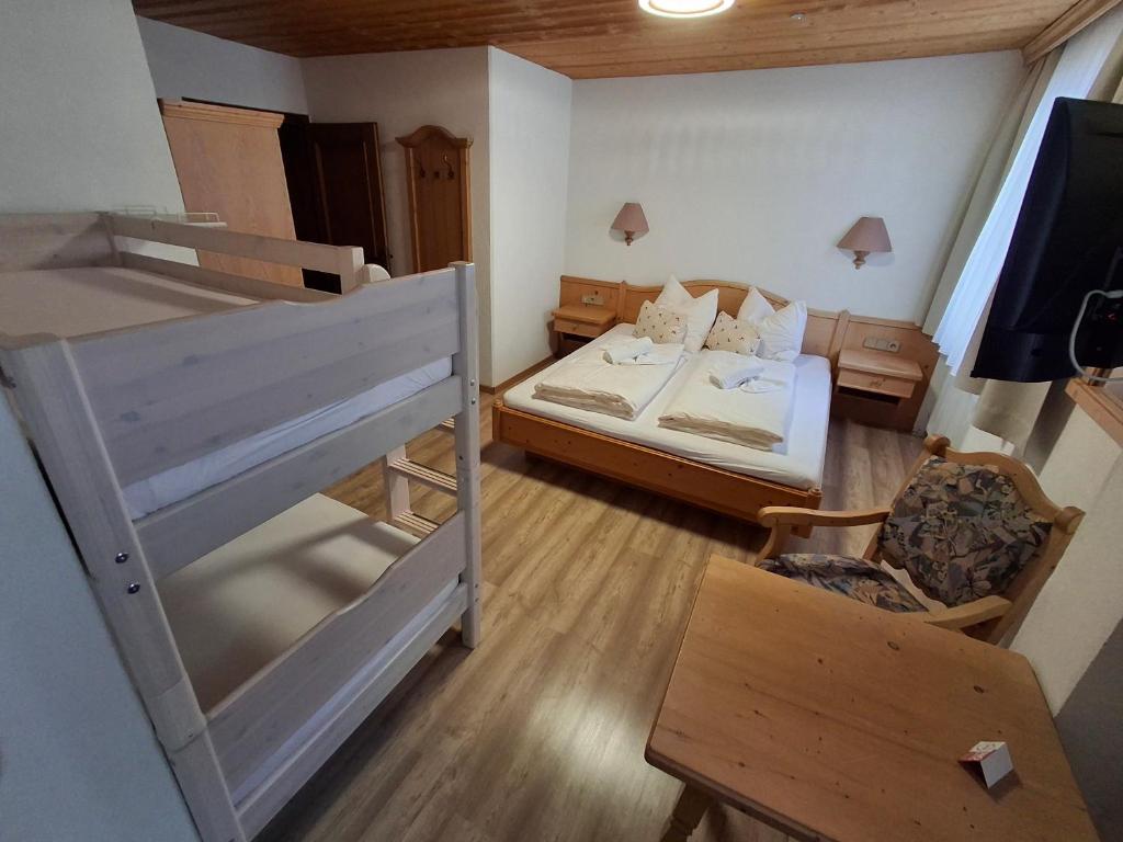 Postel nebo postele na pokoji v ubytování Pension Razil