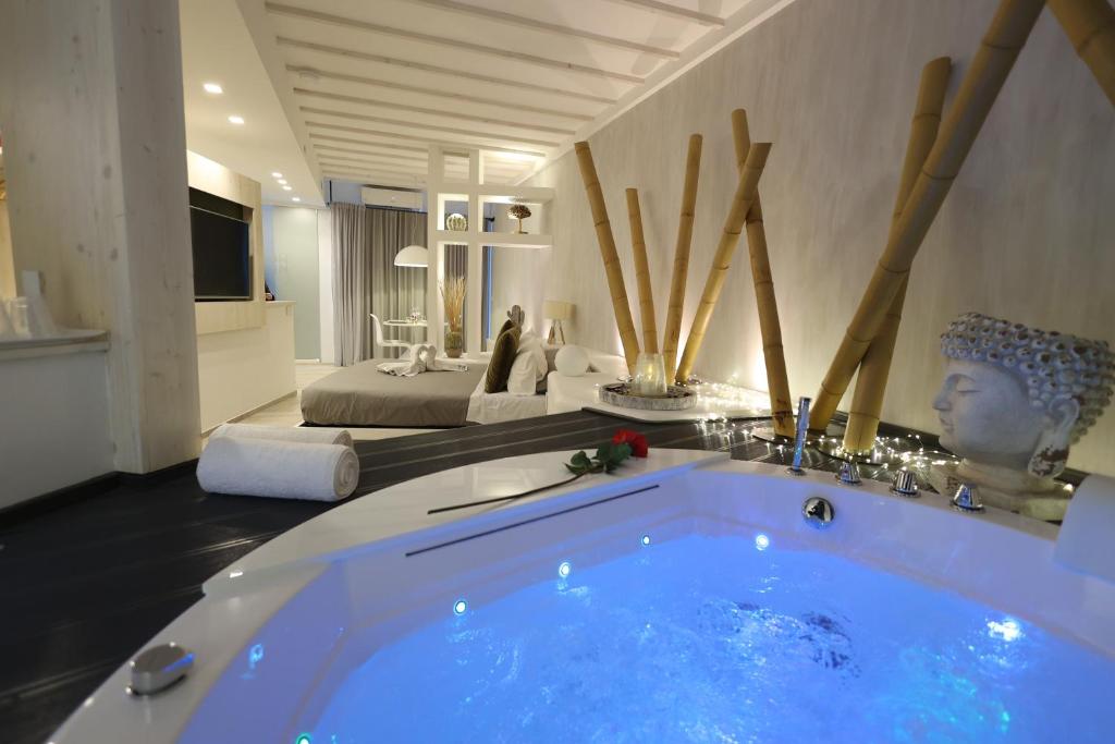 a large bathroom with a tub in the middle of a room at Suite Home3 bed in Bisceglie