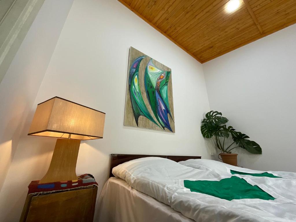 Postel nebo postele na pokoji v ubytování Art Rooms Garni B&B