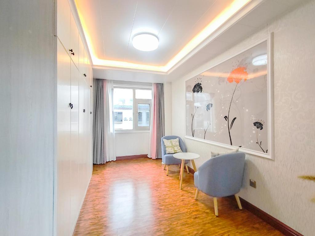 Fotografie z fotogalerie ubytování 凨凪凮夙雪山观景酒店 v destinaci Baisha