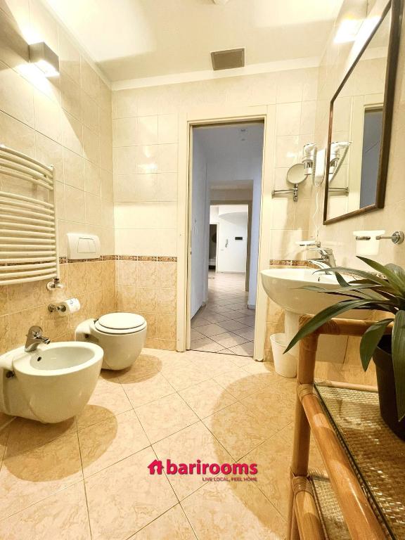 Koupelna v ubytování BARI ROOMS Abate Gimma