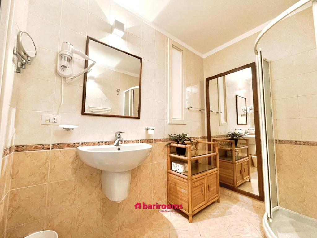 Koupelna v ubytování BARI ROOMS Abate Gimma