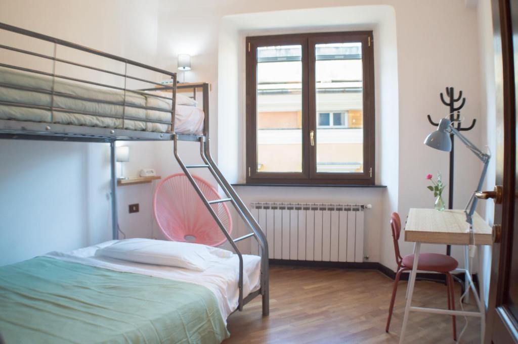 Postel nebo postele na pokoji v ubytování OStellin Genova Hostel