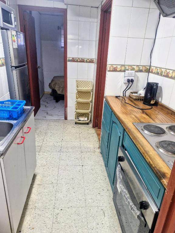 Una cocina o zona de cocina en Hostal Arrayan