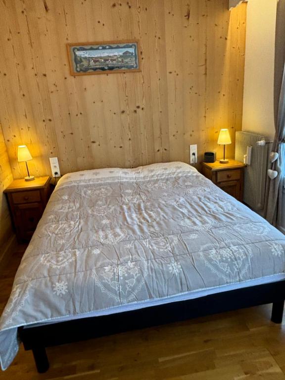 Postel nebo postele na pokoji v ubytování Vue Mont Blanc et toute la chaîne