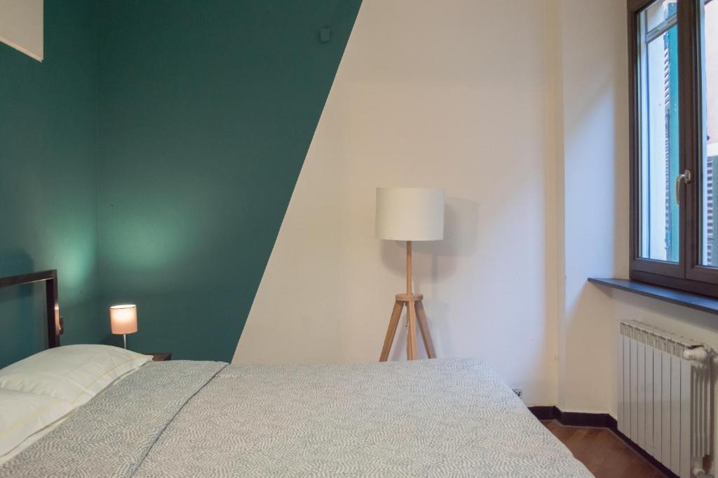 Postel nebo postele na pokoji v ubytování OStellin Genova Hostel