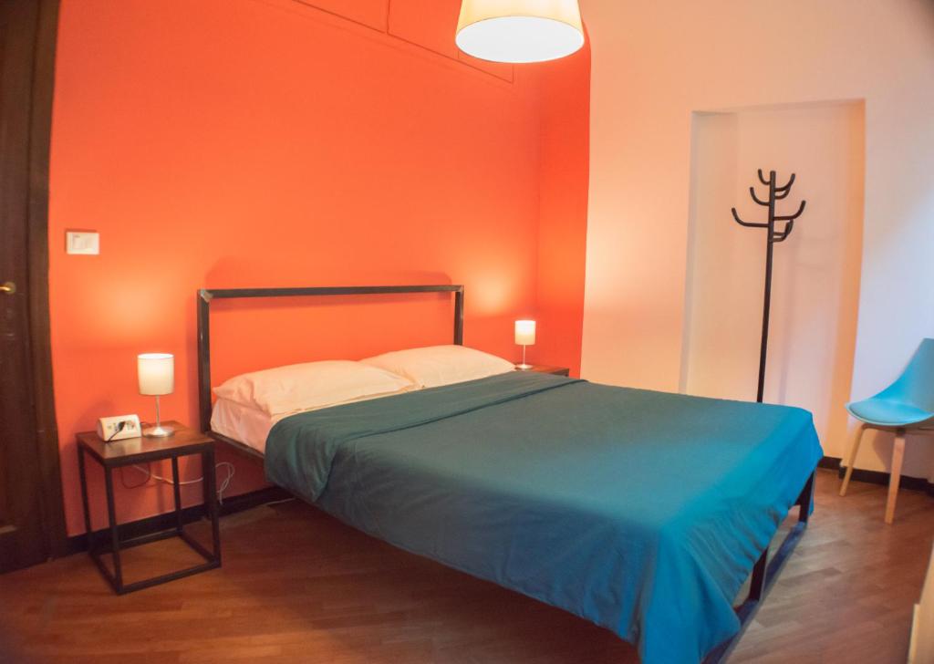 Postel nebo postele na pokoji v ubytování OStellin Genova Hostel