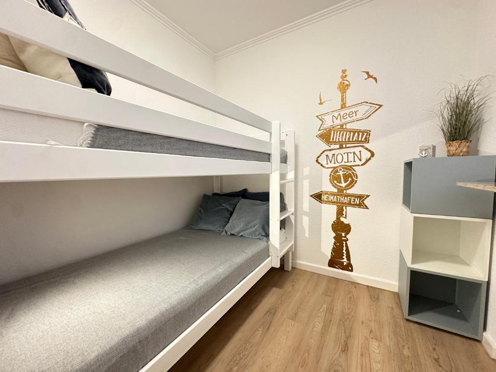 Postel nebo postele na pokoji v ubytování BeachSide Grömitz