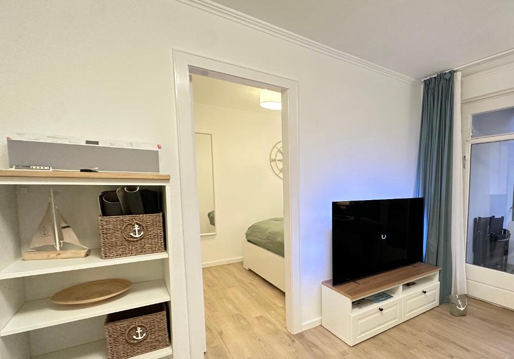 TV a/nebo společenská místnost v ubytování BeachSide Grömitz