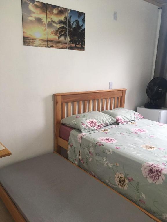 Postel nebo postele na pokoji v ubytování Mar Doce Lar Suítes Trindade