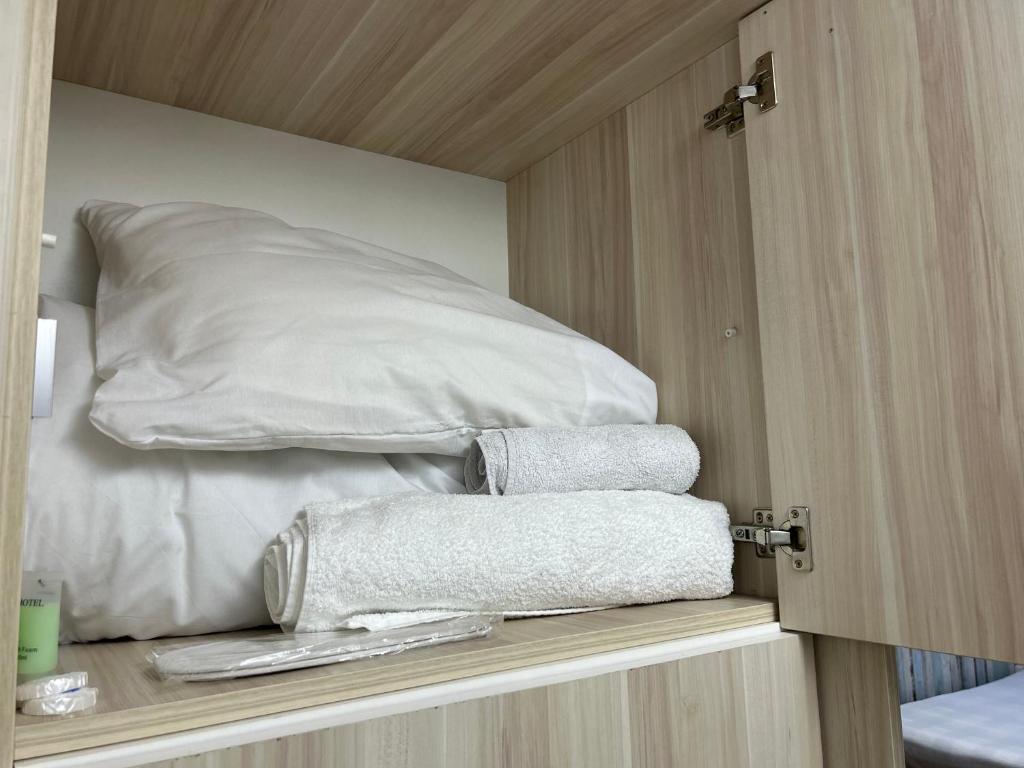 Postel nebo postele na pokoji v ubytování Porta Hostel