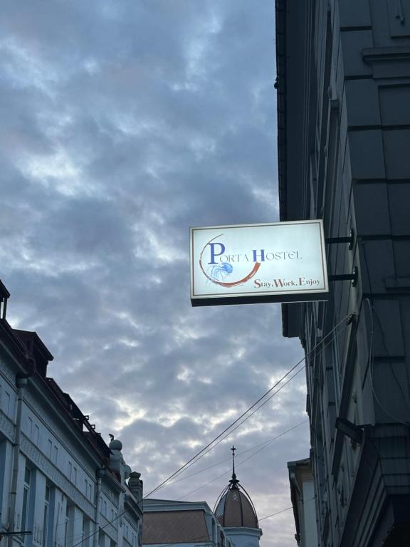 Certifikát, hodnocení, plakát nebo jiný dokument vystavený v ubytování Porta Hostel