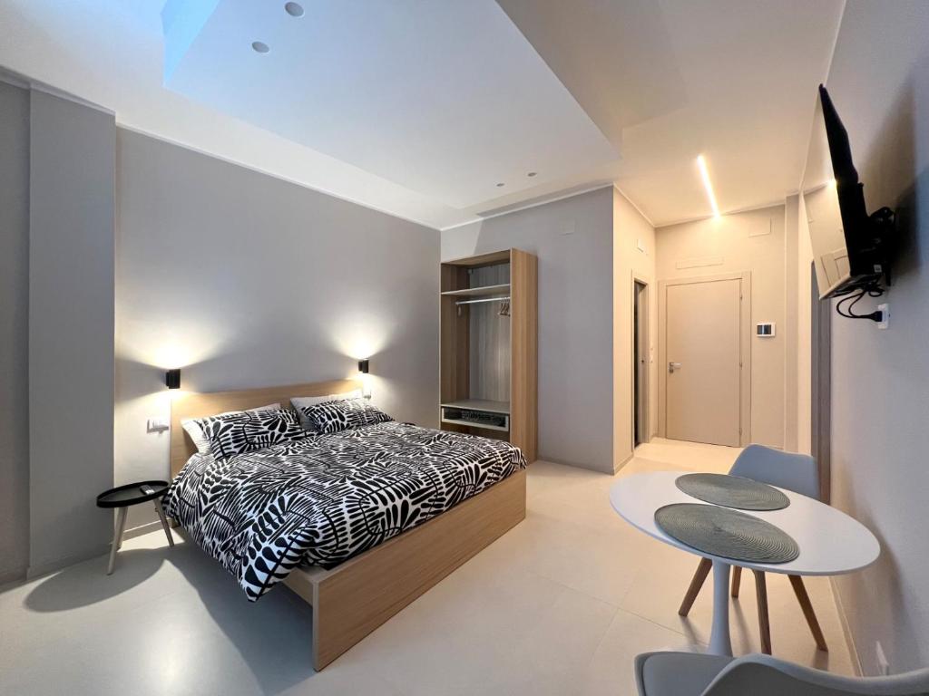 Postel nebo postele na pokoji v ubytování B&B Il Rifugio Urbano