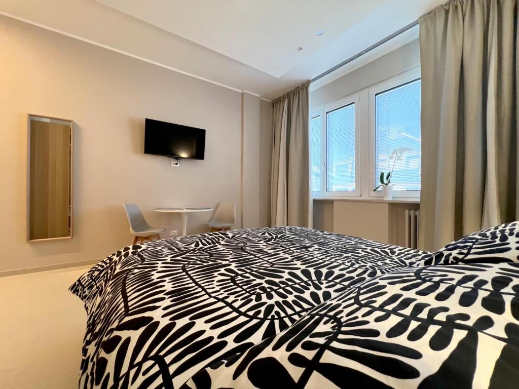 Postel nebo postele na pokoji v ubytování B&B Il Rifugio Urbano