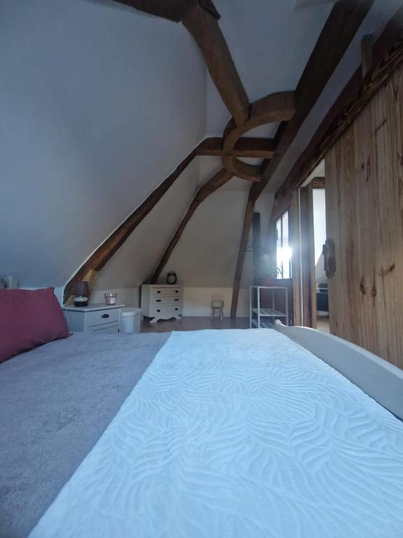 Postel nebo postele na pokoji v ubytování Appartement duplex beaucens