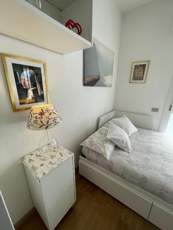 Postel nebo postele na pokoji v ubytování A UN PASSO DALL'OSPEDALE