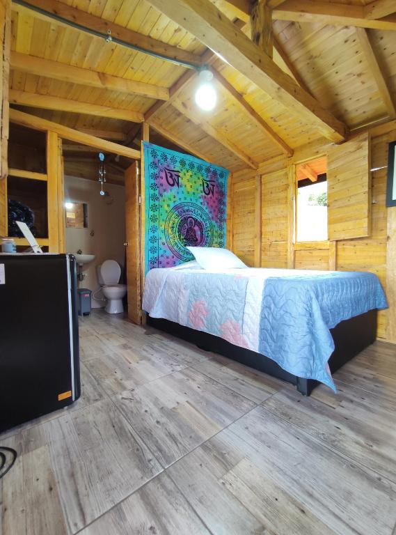 Postel nebo postele na pokoji v ubytování Finca AVALON Alejandria Antioquia