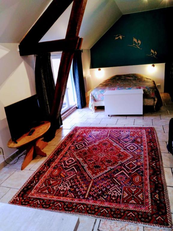 Postel nebo postele na pokoji v ubytování Chambres et Table d'hôtes Cerviña