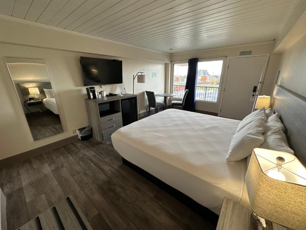 Postel nebo postele na pokoji v ubytování Westport Inn