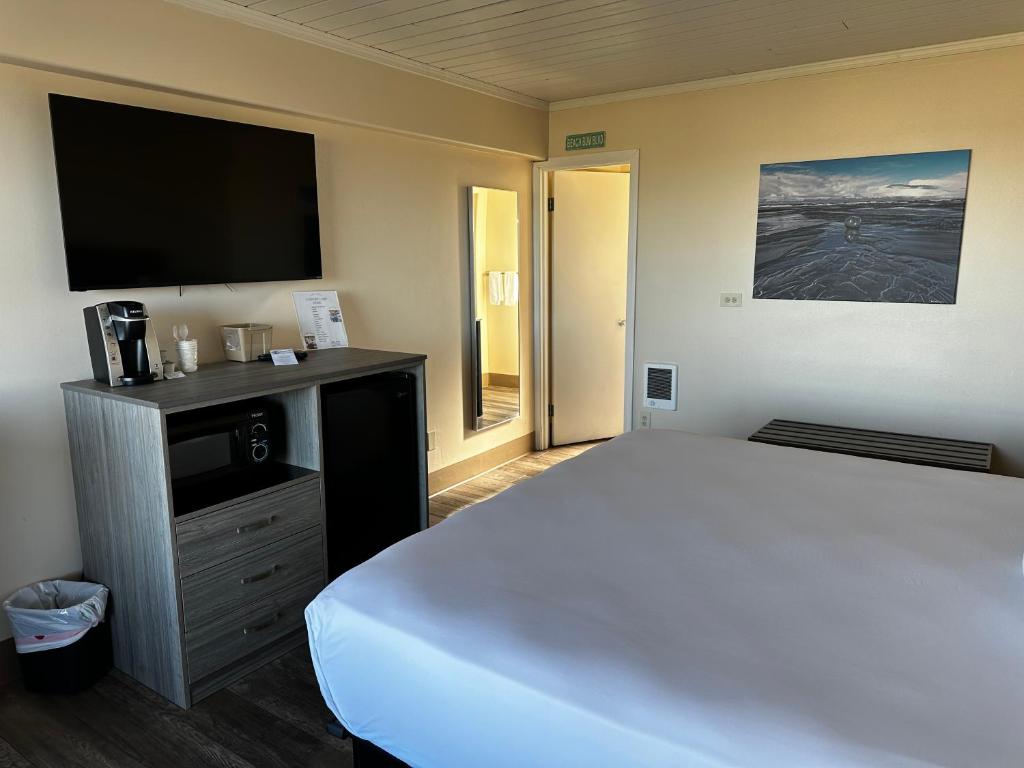 Postel nebo postele na pokoji v ubytování Westport Inn