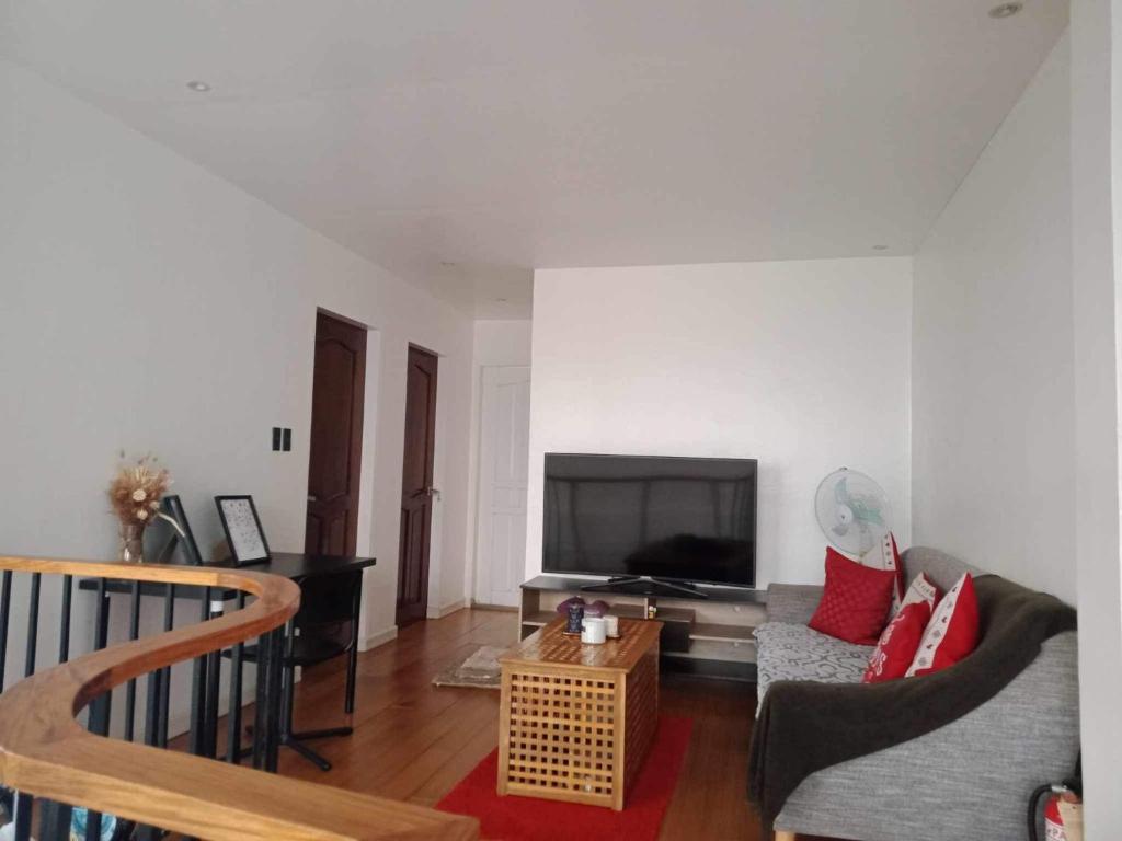 TV a/nebo společenská místnost v ubytování RLJ Beach House