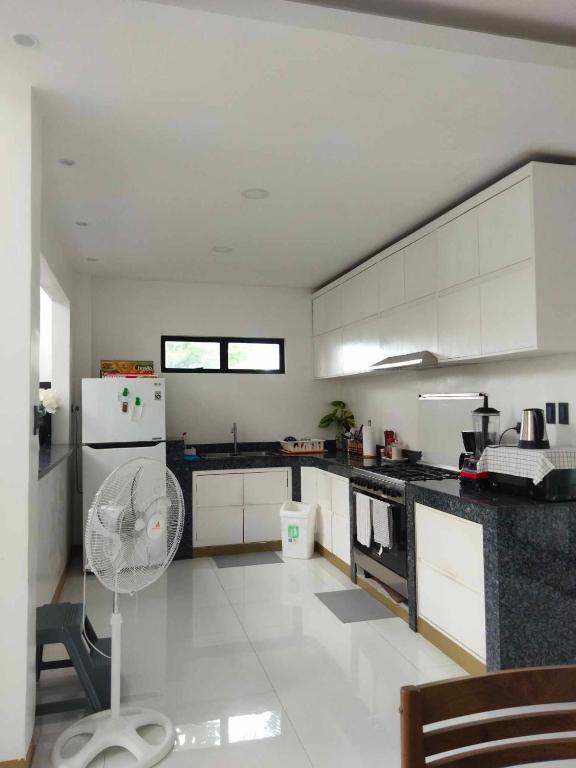 Kuchyň nebo kuchyňský kout v ubytování RLJ Beach House