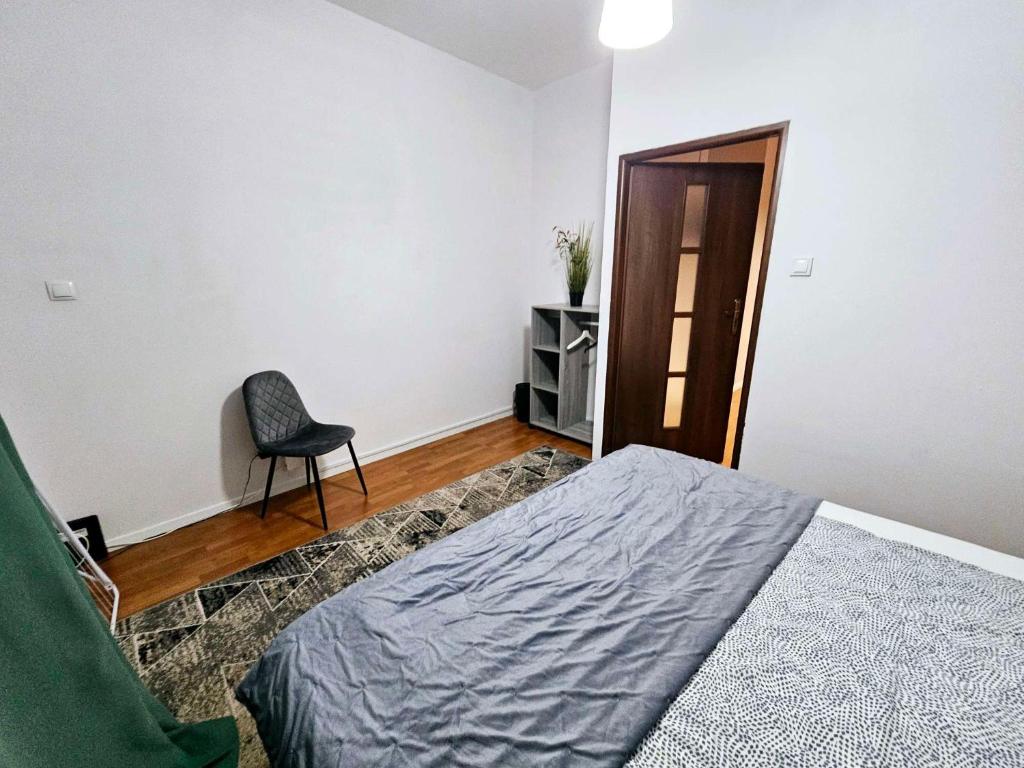 Posteľ alebo postele v izbe v ubytovaní FIRST -- Green Żoliborz apartment 3
