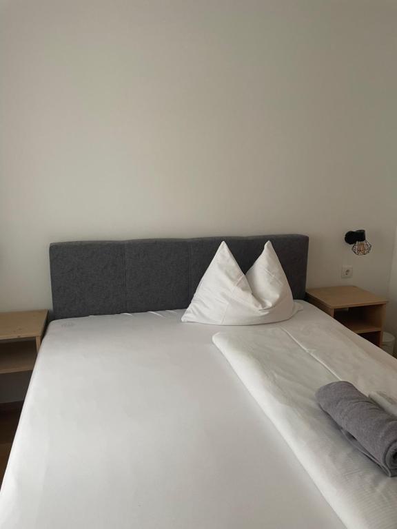 Postel nebo postele na pokoji v ubytování Haus Alpenland
