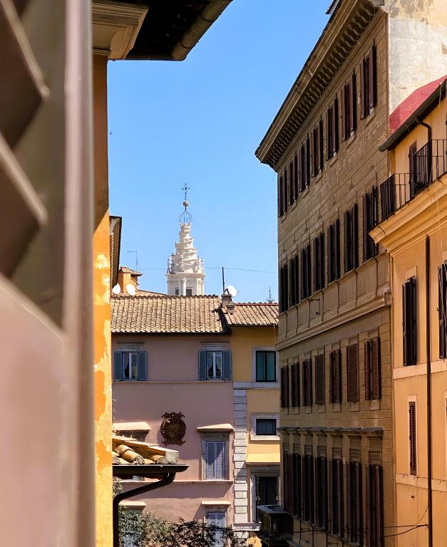 una vista da una finestra di una strada della città di The Best Nest - Home Suite Home NEW OPENING a Roma