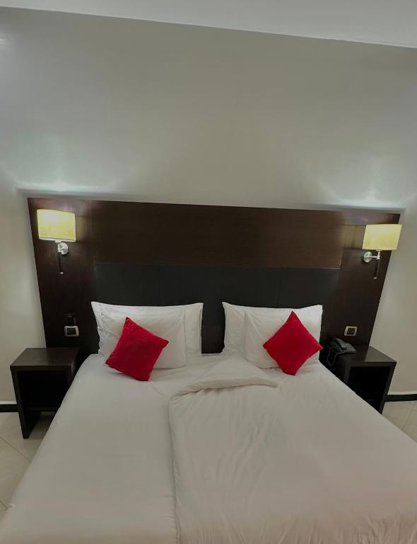 Postel nebo postele na pokoji v ubytování Hotel Oscar 1
