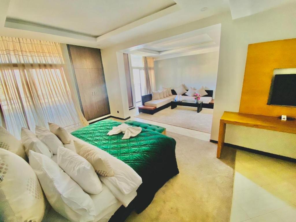 TV a/nebo společenská místnost v ubytování Hotel Oscar 1