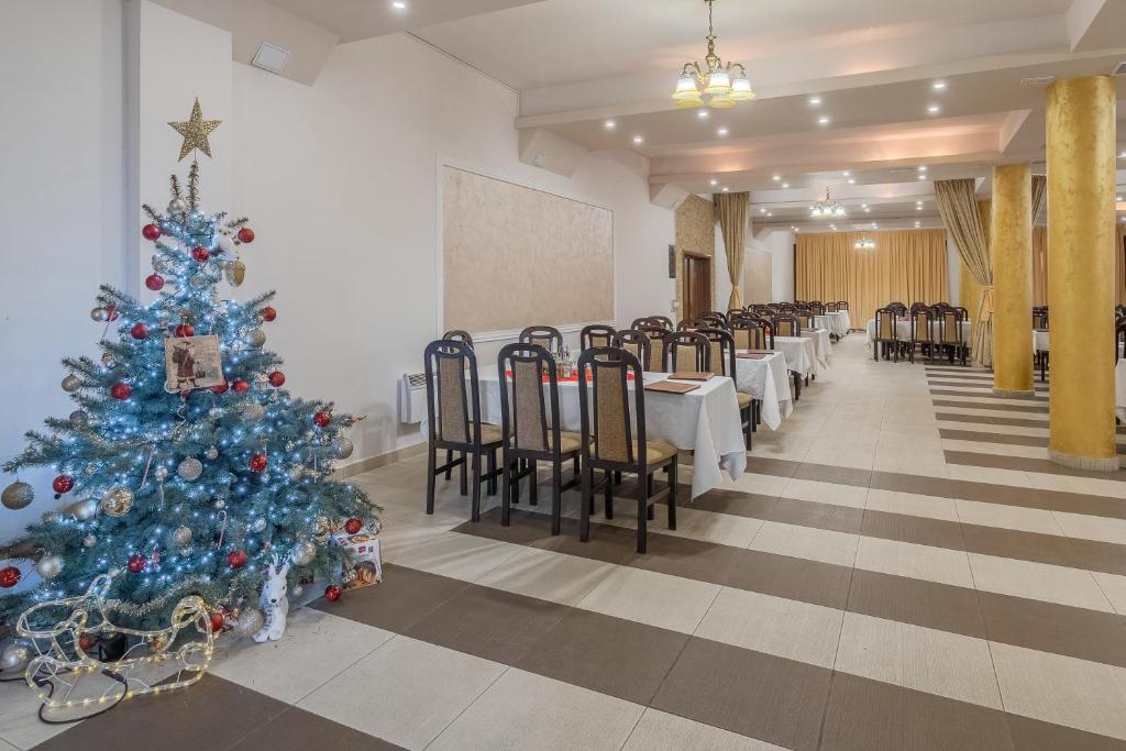 Restaurace v ubytování Pensiunea Popasul Ursilor