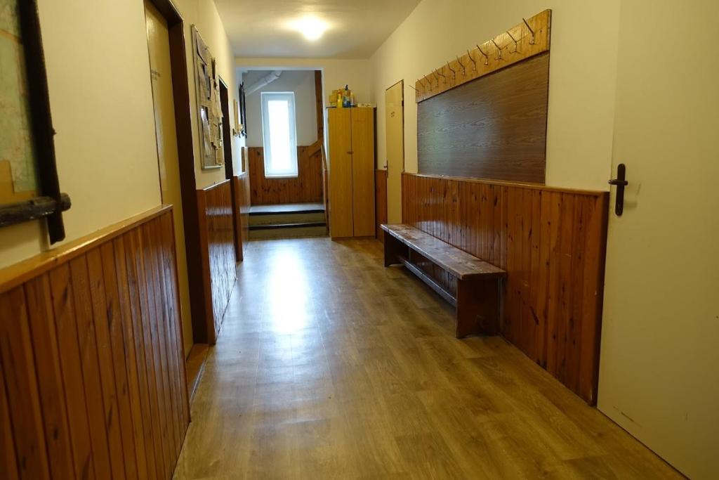 Voodi või voodid majutusasutuse Chaloupka Kořenov toas