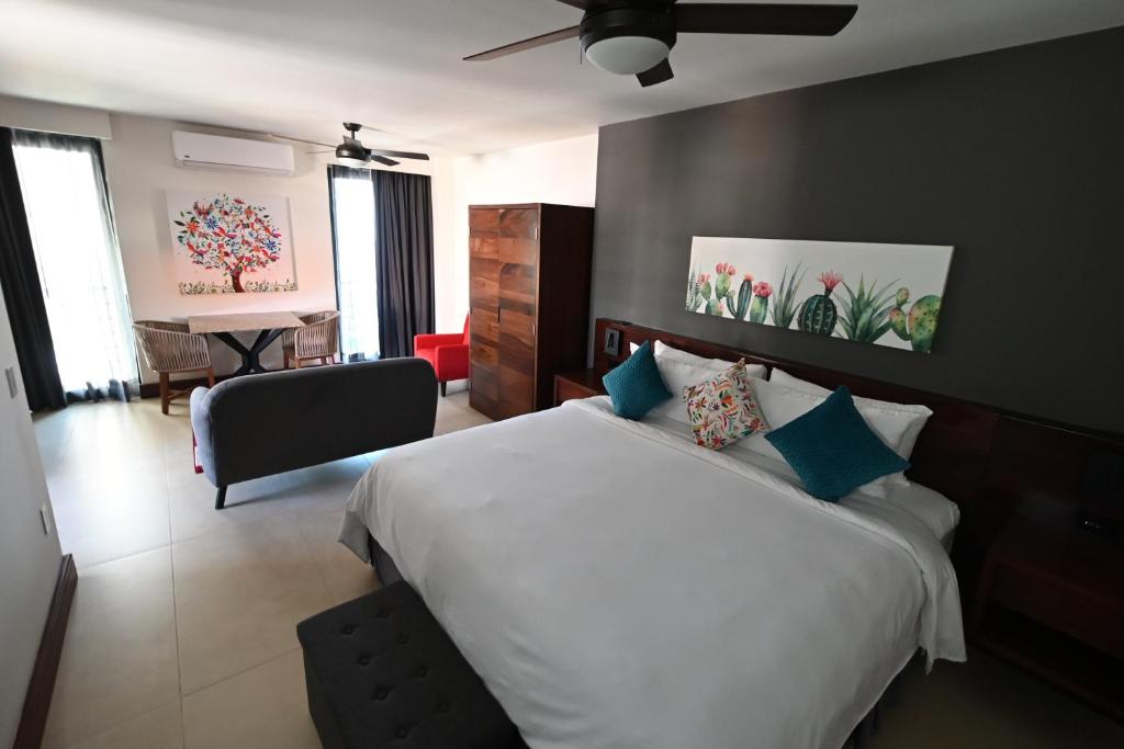 Voodi või voodid majutusasutuse Barrio Vallarta Boutique Studios toas