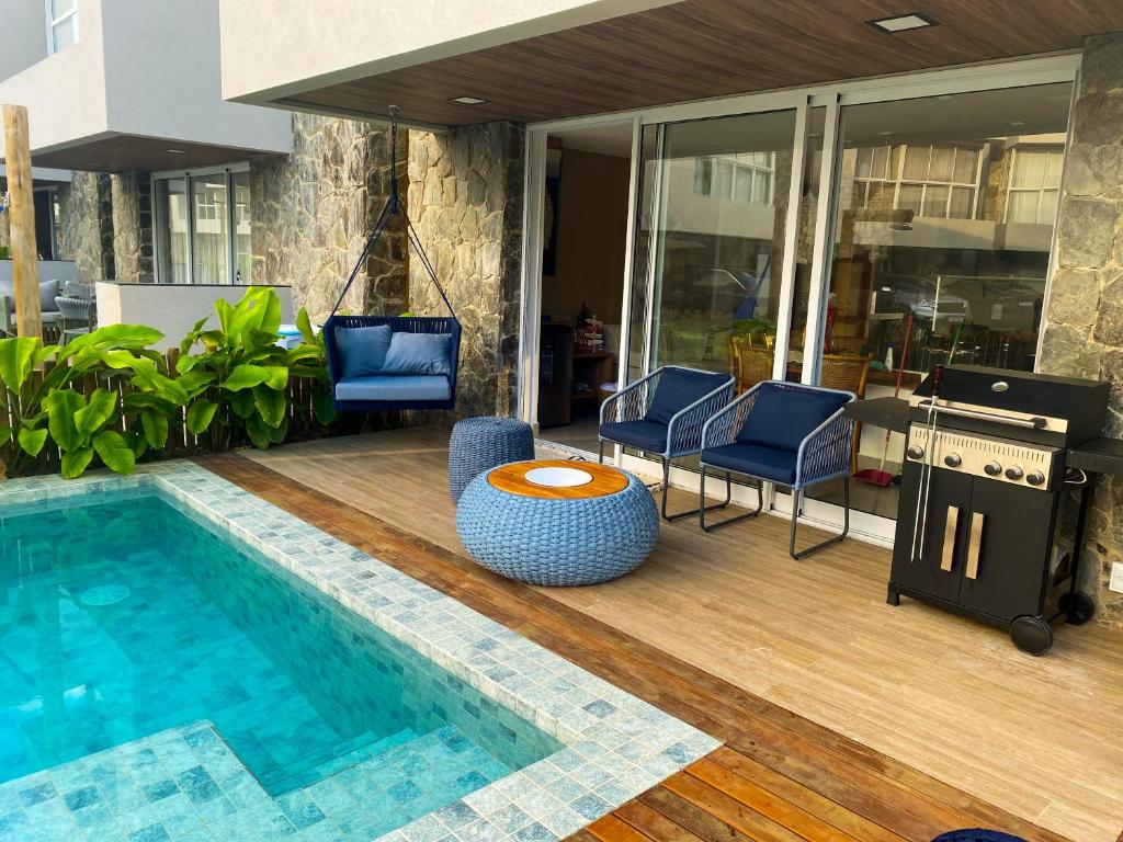 Πισίνα στο ή κοντά στο Casa Boho-Rota dos Milagres-Condomínio pé na areia