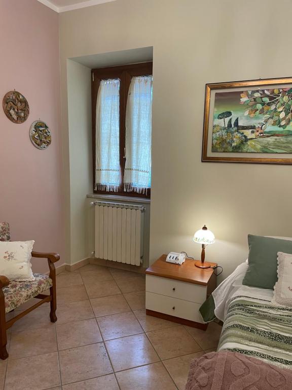 Postel nebo postele na pokoji v ubytování La Feijoa
