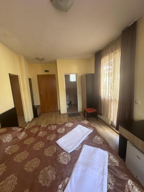 Postel nebo postele na pokoji v ubytování Hotel MERIDA