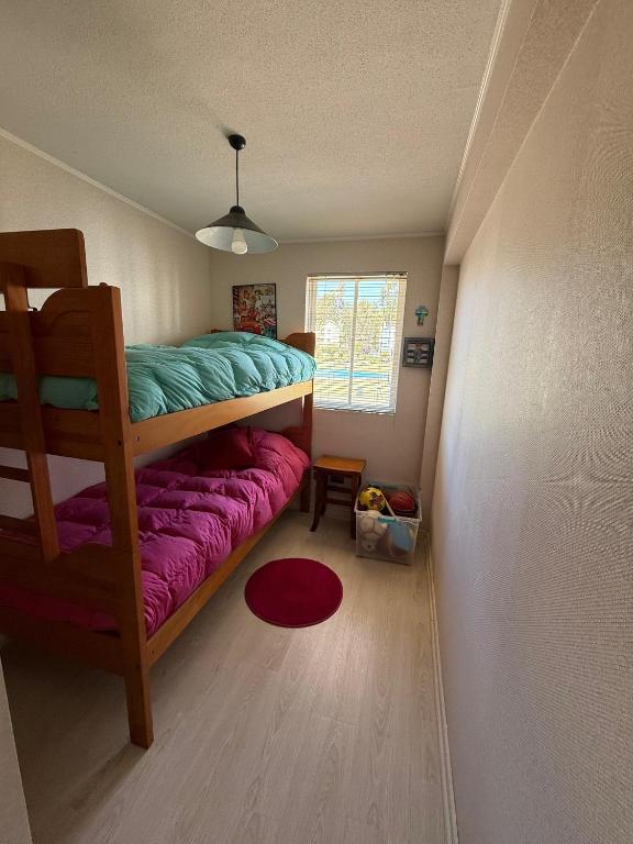 Postel nebo postele na pokoji v ubytování Departamento en Algarrobo Condominio Altos de Mirasol