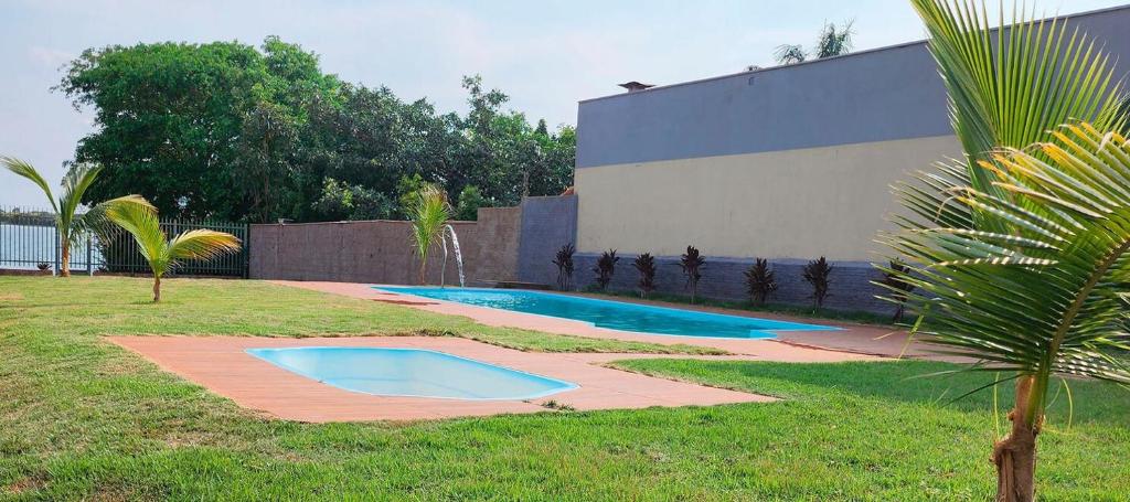 Kolam renang di atau dekat dengan Otimo rancho com churrasqueira - Miguelopolis SP