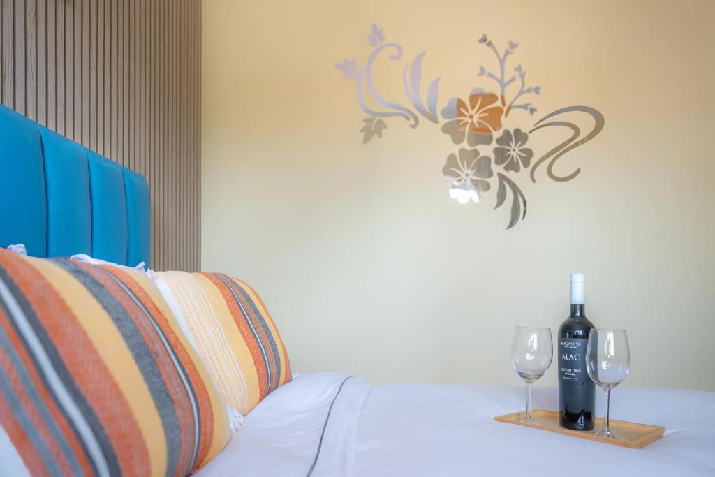 Кровать или кровати в номере Gold Coast Photography Inn