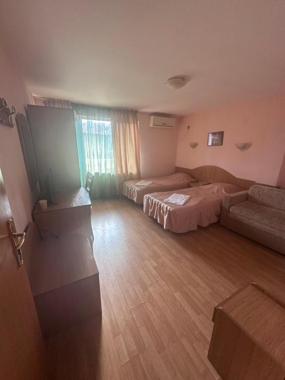 Postel nebo postele na pokoji v ubytování Hotel MERIDA