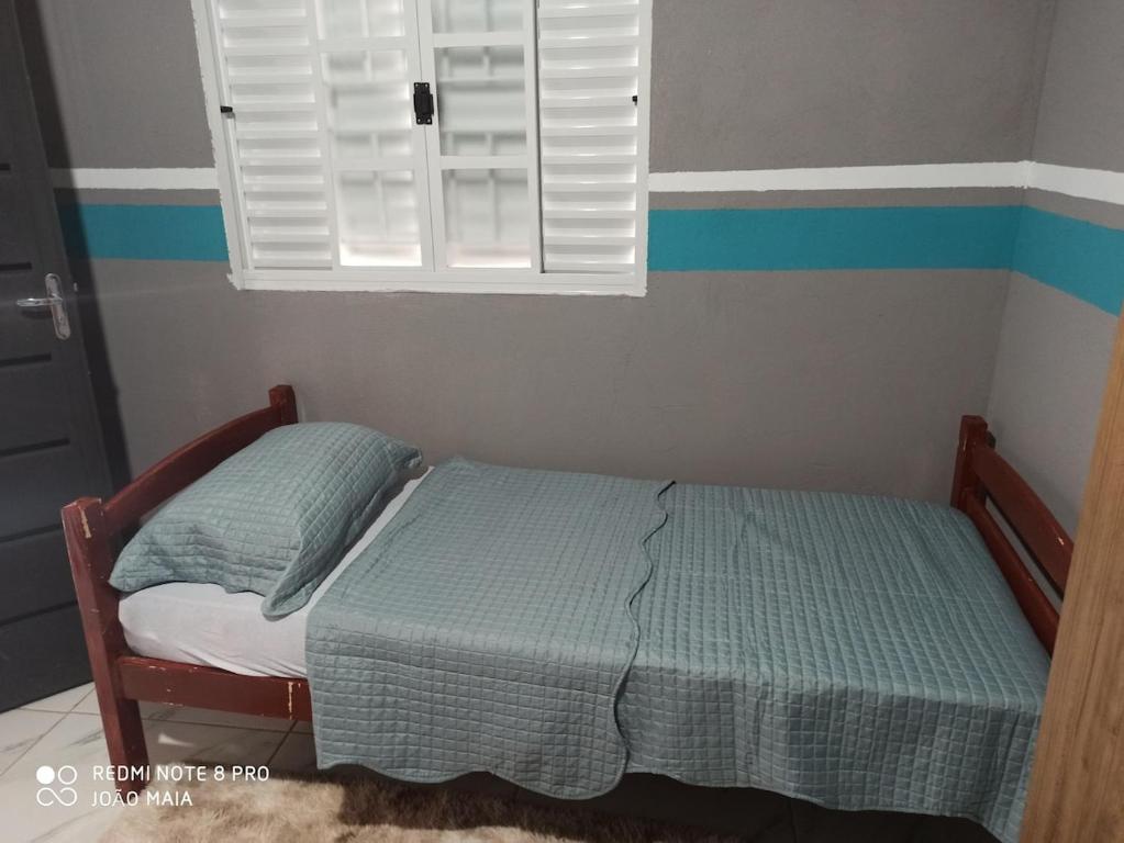 Postel nebo postele na pokoji v ubytování Casa João Maia