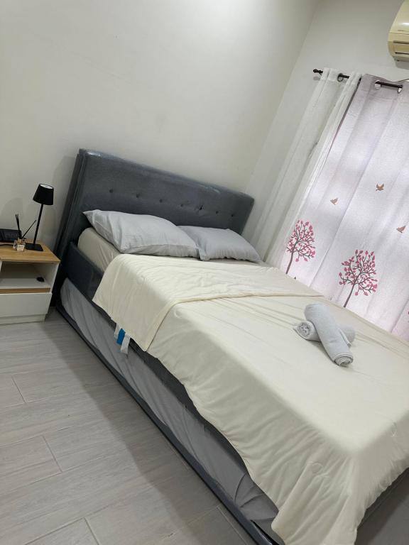 Postel nebo postele na pokoji v ubytování 3 bedroom in San Fernando La Union Near CSI, SM, Puregold