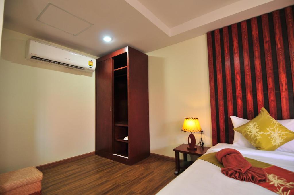 Letto o letti in una camera di Phi Phi Little Star Resort