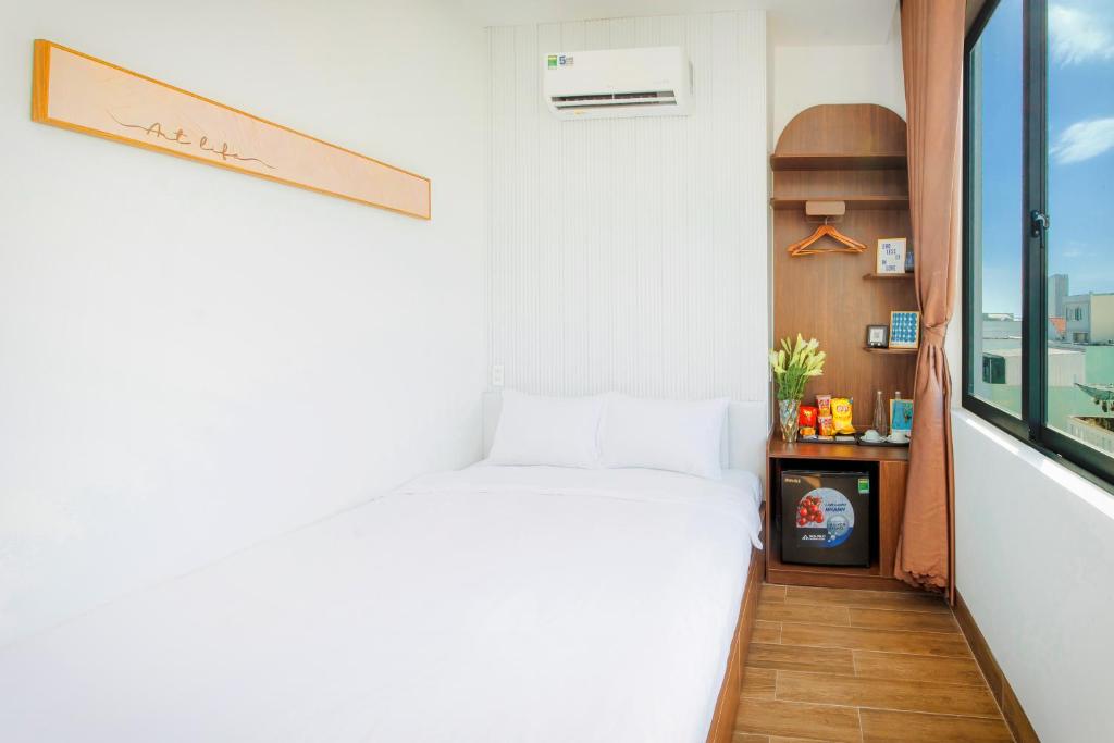 Giường trong phòng chung tại The BackPacker Hotel