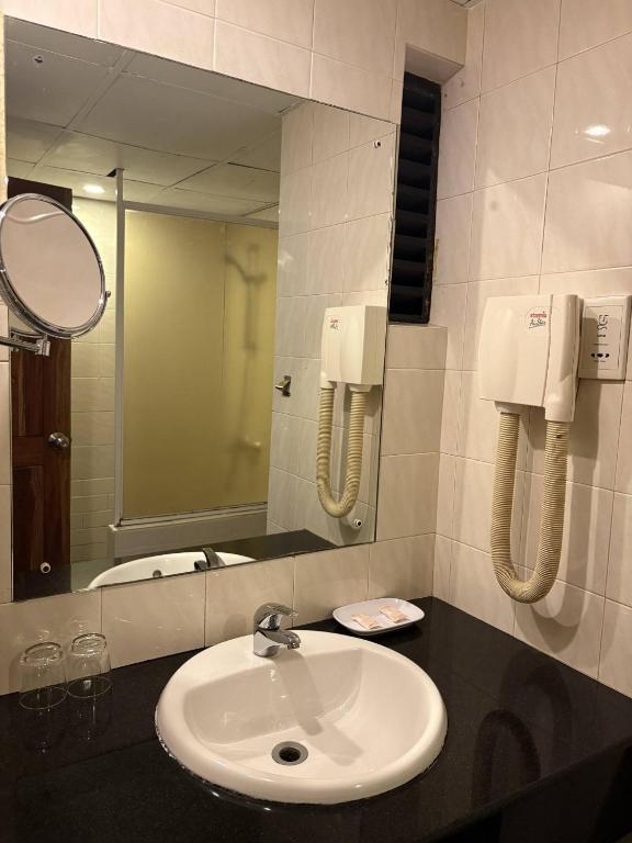 Koupelna v ubytování Hotel Janaki