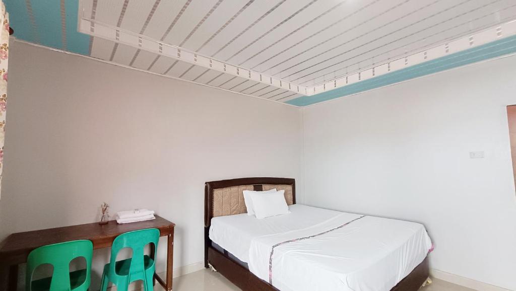 Postel nebo postele na pokoji v ubytování Aloha Guest House Nias